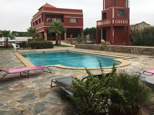 villa with pool by the sea