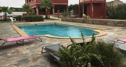 villa with pool by the sea