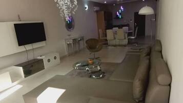 Luxury Apartment, 1 Bedroom | Living area | TV