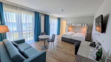 Familienzimmer | Allergikerbettwaren, Minibar, Zimmersafe, Schreibtisch