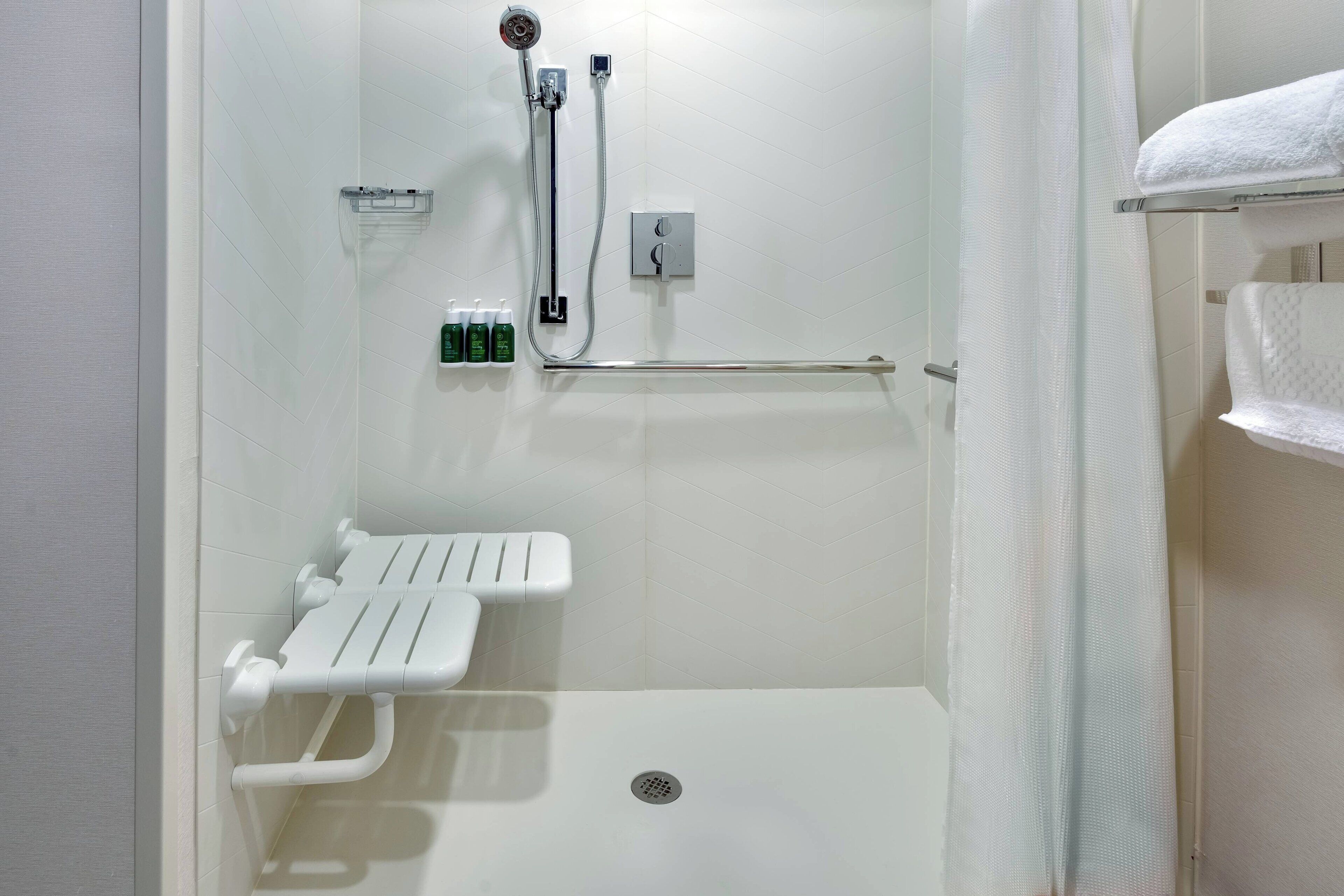 combined shower/bathtub, free toiletries, hair dryer, towels