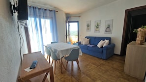Panoramic Apartment, 2 Bedrooms, Sea View | Living area | Flat-screen TV