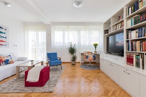 Apartamento urbano | Área de estar | TV de tela plana