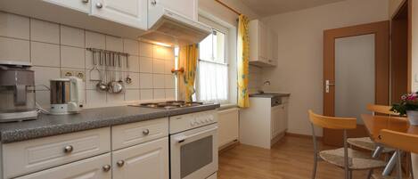 Fridge, oven, dishwasher, highchair