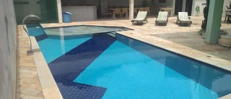 Outdoor pool, open 7:30 AM to midnight, pool umbrellas, sun loungers