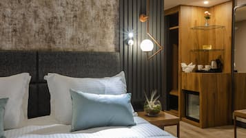 Luxe beddengoed, een minibar, een kluis op de kamer, een laptopwerkplek