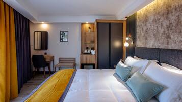 Premium bedding, minibar, in-room safe, laptop workspace