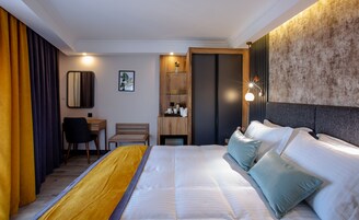 Ropa de cama de alta calidad y minibar 