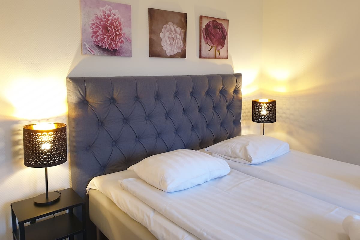 Chambres insonorisées, fer et planche à repasser, Wi-Fi gratuit