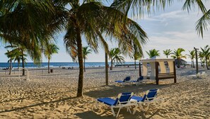 On the beach, sun-loungers, beach towels