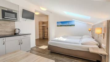 Apartment | Schreibtisch, Zustellbetten, kostenloses WLAN, Bettwäsche