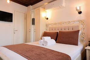 Premium bedding, free minibar items, individually decorated