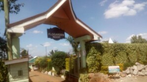 A gated entrance with a sign reading "Floggarden Resort". - Flo Garden Resort (Ruiru)