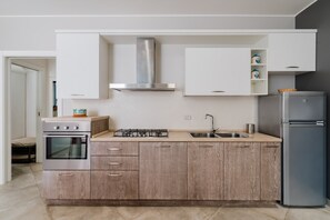 Fridge, oven, stovetop, high chair