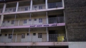A multi-story building with balconies and a sign reading "HAQ GUEST HOUSE LANGA". - Haqy Guest House (Nakuru)