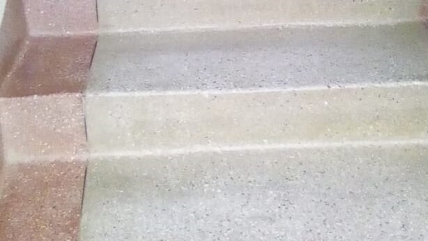 A staircase with alternating red and beige steps leading upwards. - Haqy Guest House (Nakuru)