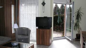 Smart-TV, BĂŒcher, Stereoanlage