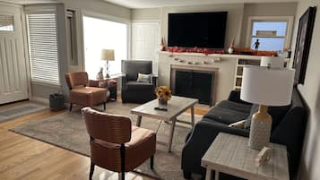 Smart TV, fireplace, DVD player, books