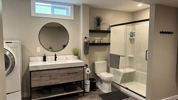 Shower, hair dryer, towels, soap