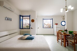 1 habitación, tabla de planchar con plancha, wifi y ropa de cama 