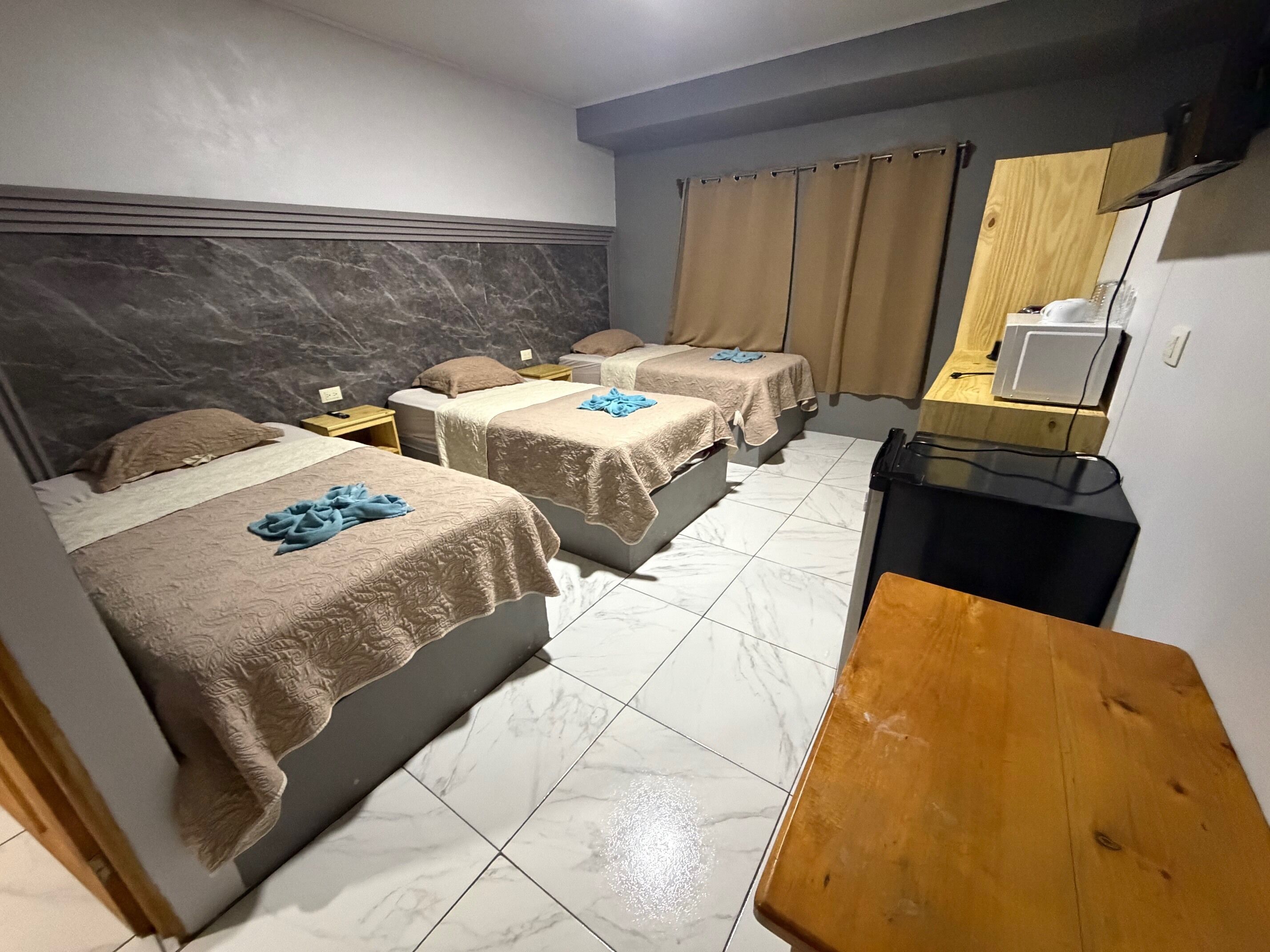 Blackout drapes, WiFi (free), bed sheets