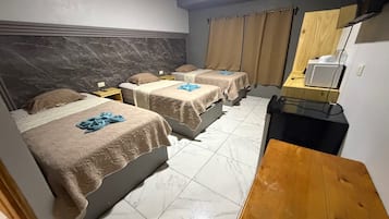 Blackout drapes, WiFi (free), bed sheets