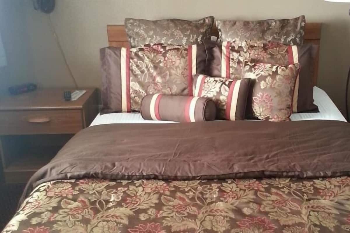 Individually furnished, desk, blackout curtains, iron/ironing board