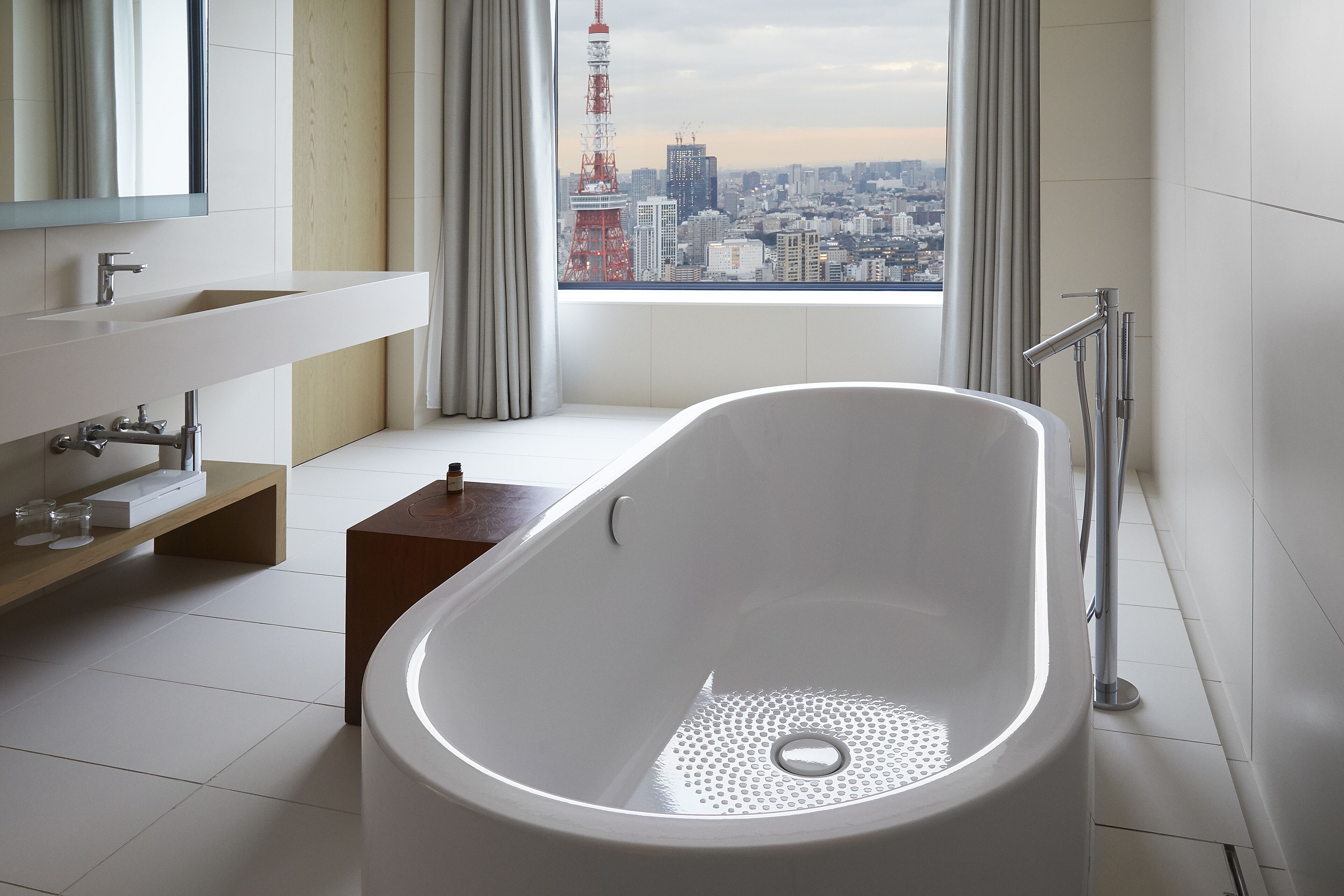 suite, 1 bedroom, tower (view) | bathroom | separate bathtub and shower, hair dryer, bathrobes, slippers