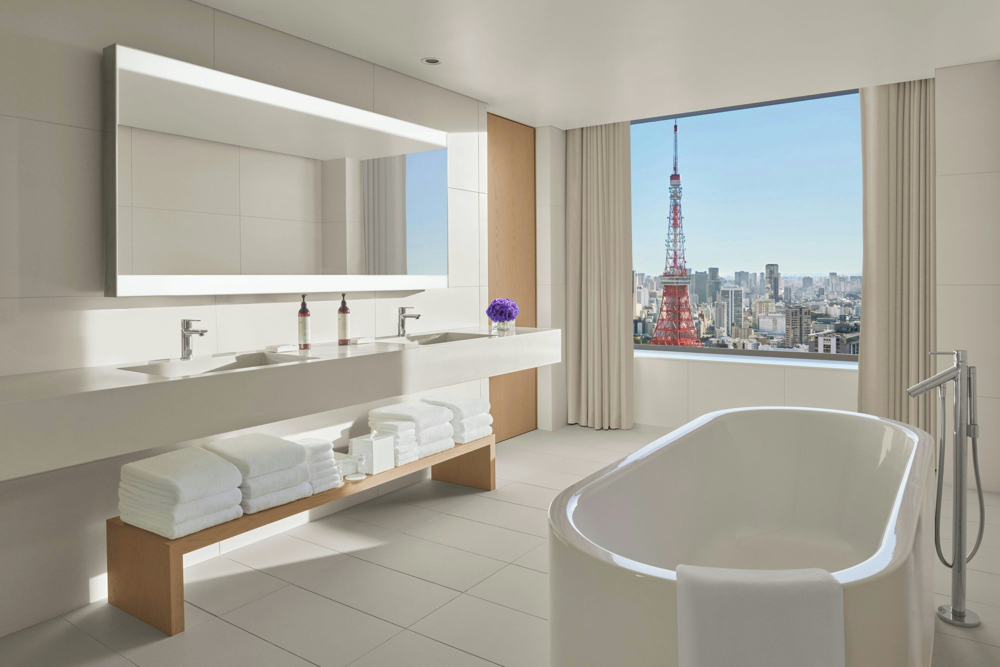 suite, 1 bedroom, tower (view) | bathroom | separate bathtub and shower, hair dryer, bathrobes, slippers