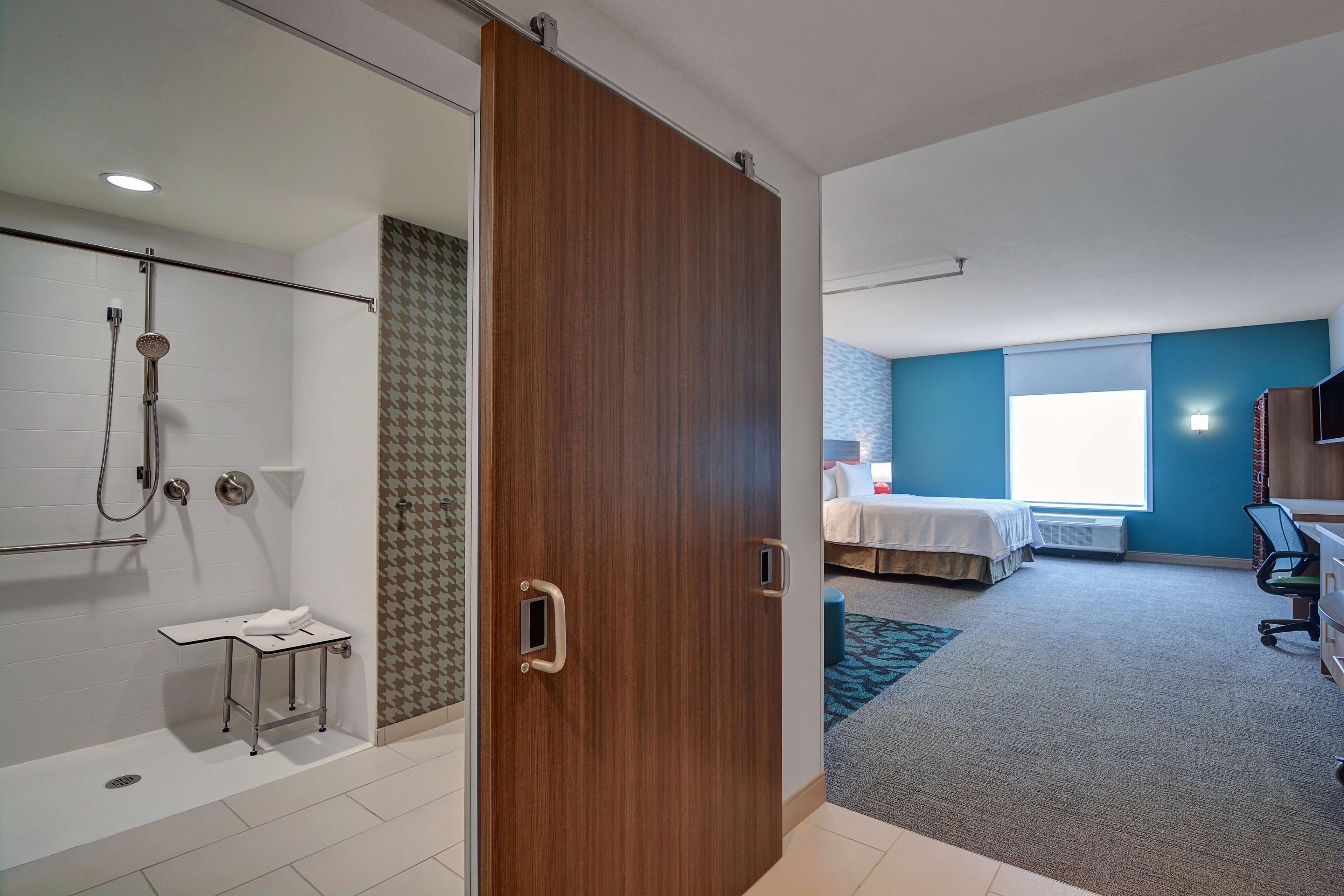 standard studio suite, 1 king bed, accessible, non smoking (roll-in shower) | bathroom | hydromassage showerhead, free toiletries, hair dryer, towels
