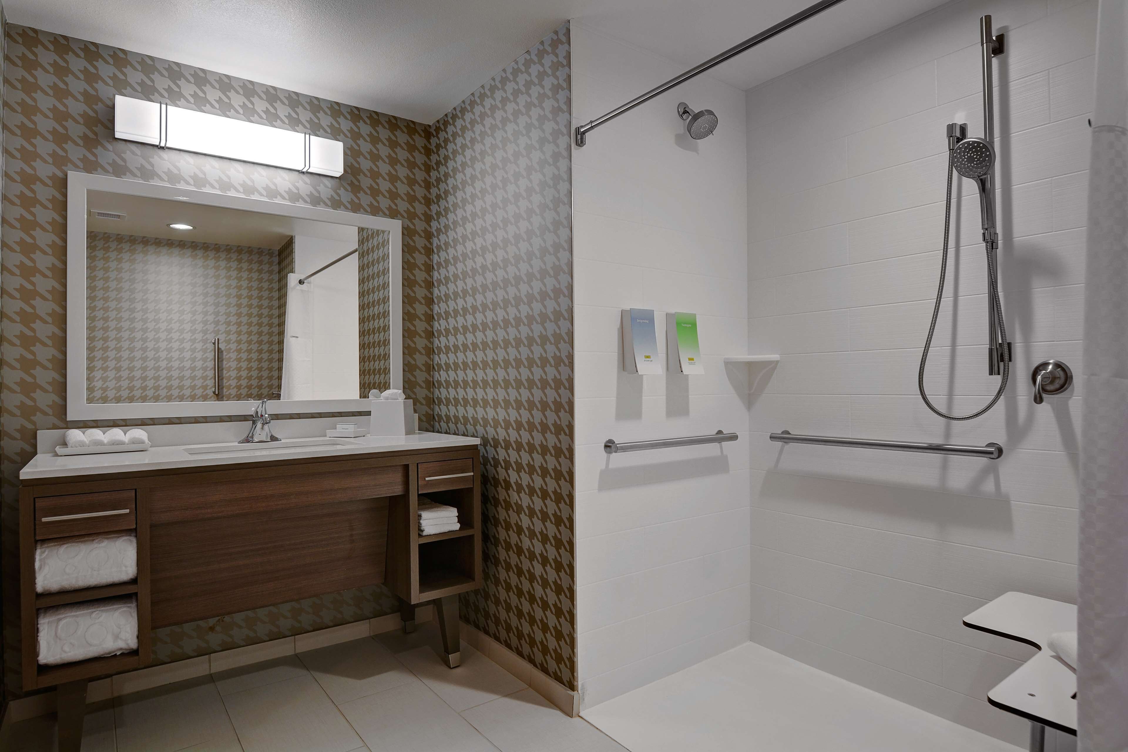 standard studio suite, 1 king bed, accessible, non smoking (roll-in shower) | bathroom | hydromassage showerhead, free toiletries, hair dryer, towels