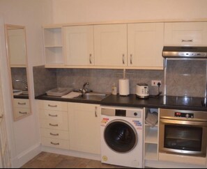 Fridge, microwave, cookware/dishes/utensils