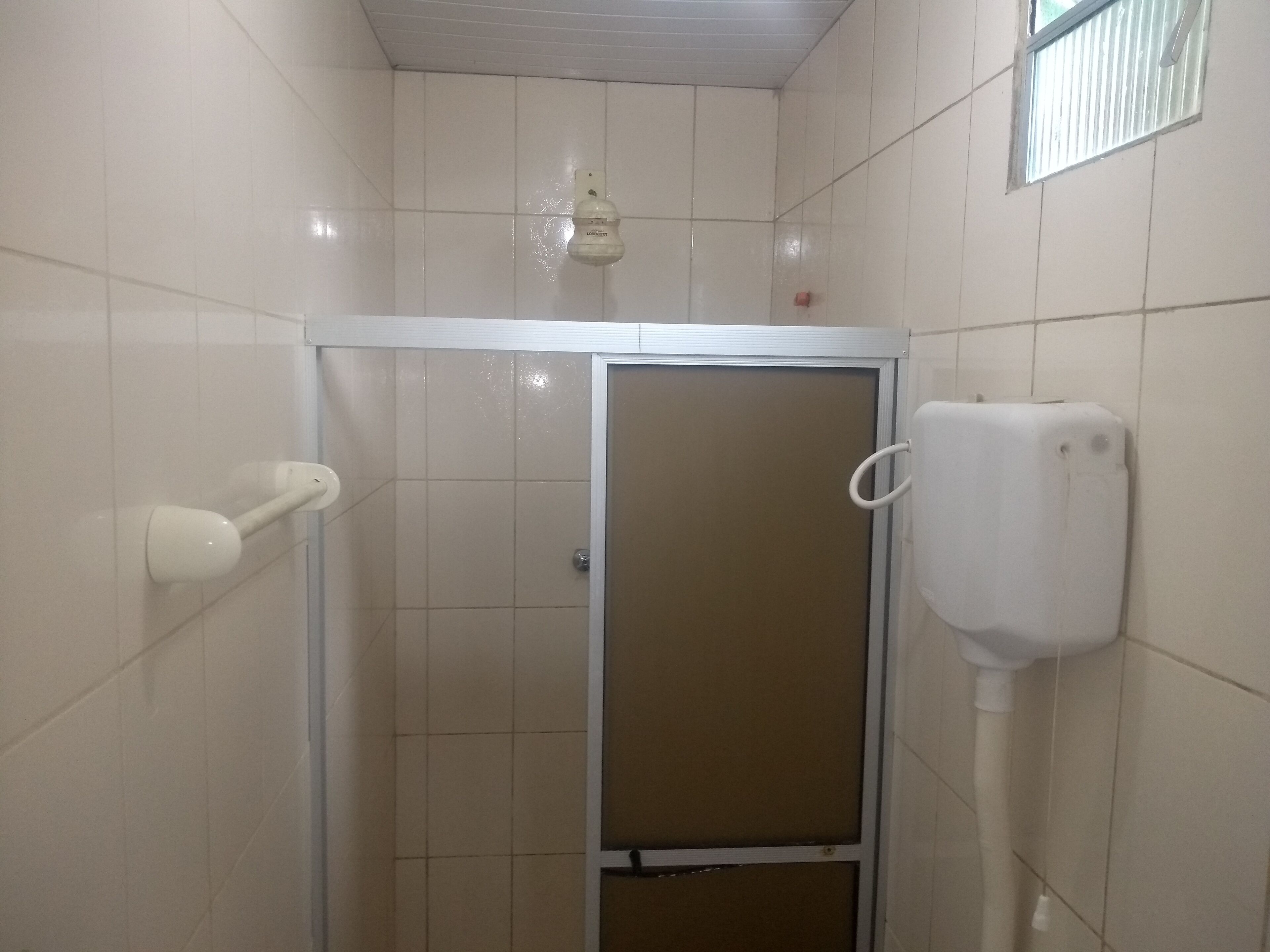 Banheira, toalhas de banho