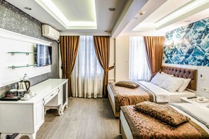 Minibar, coffres-forts dans les chambres, décoration personnalisée