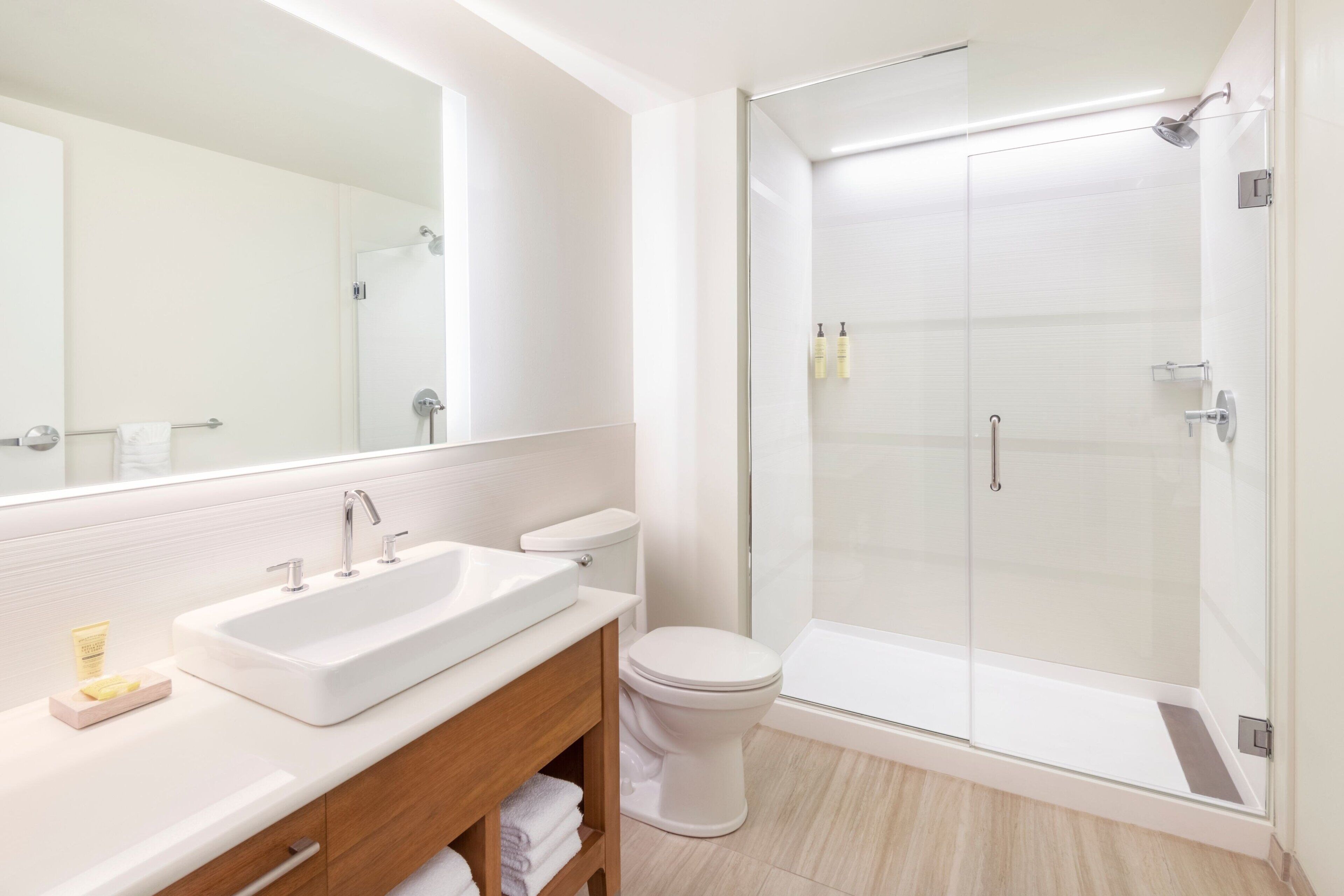 hair dryer, towels, soap, shampoo