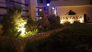 A building with a sign reading "MONTANA" and a stone pathway leading to the entrance. - Montana Connection, Hurghada (Hurghada)