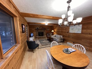 Smart TV, fireplace, books