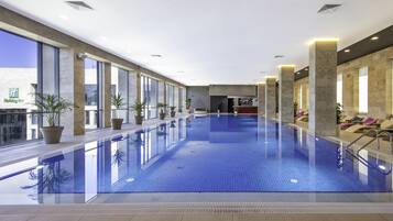 Indoor pool, open 6:30 AM to 10:30 PM, pool loungers