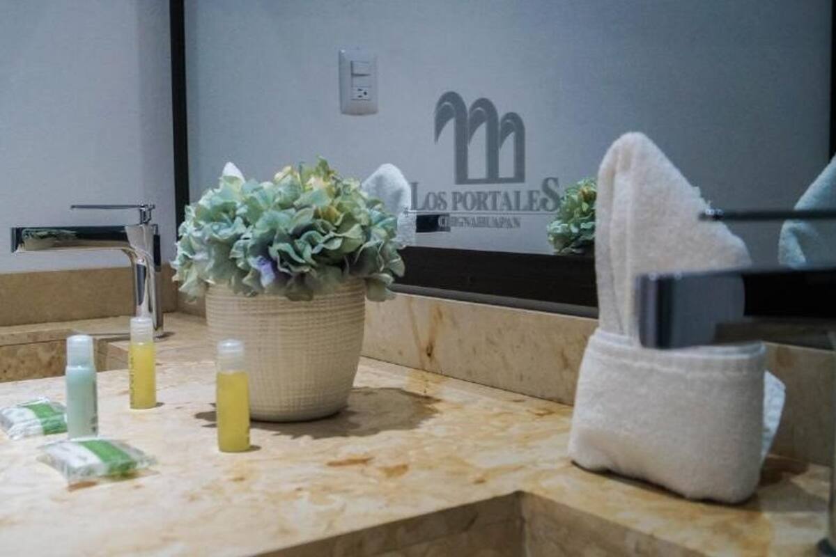 shower, rainfall showerhead, towels, soap