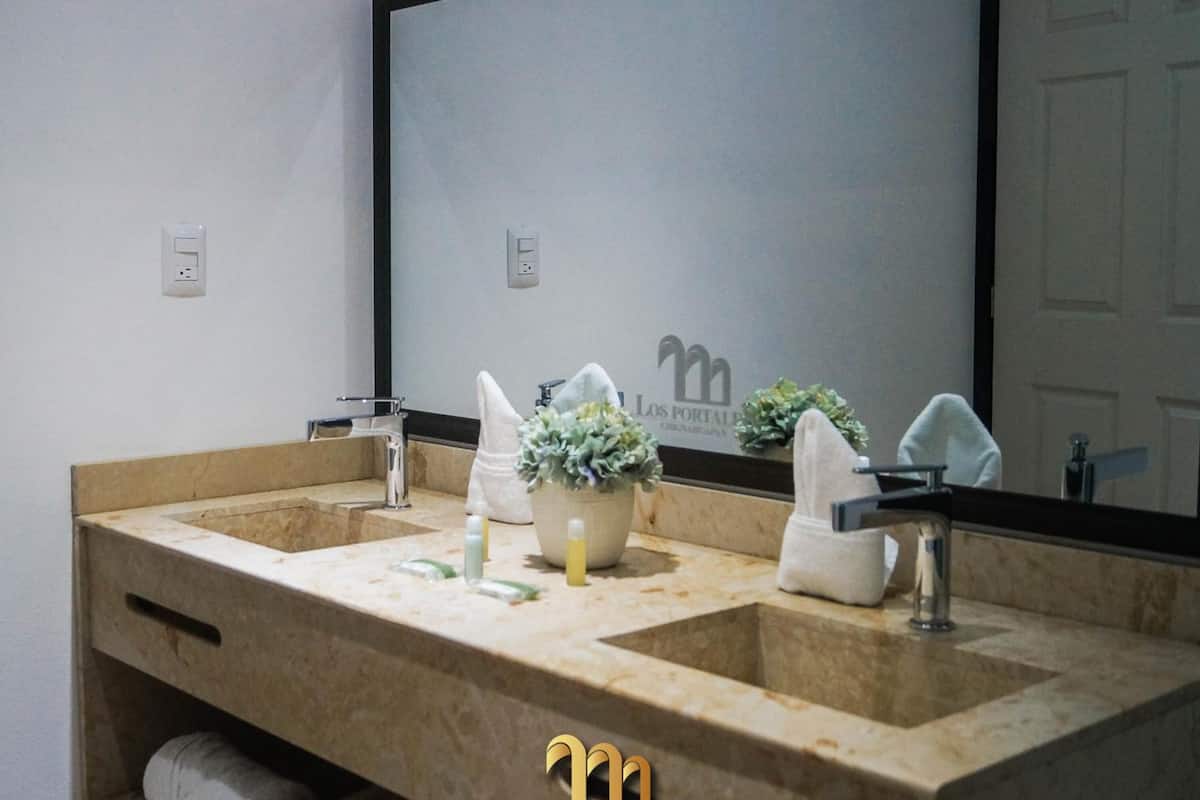 shower, rainfall showerhead, towels, soap