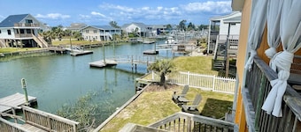 2 bedrooms, 1 bathroom. Pet friendly with a fenced in back yard. Located on canal with dock the perfect place for fishing, crabbing, or docking your boat.