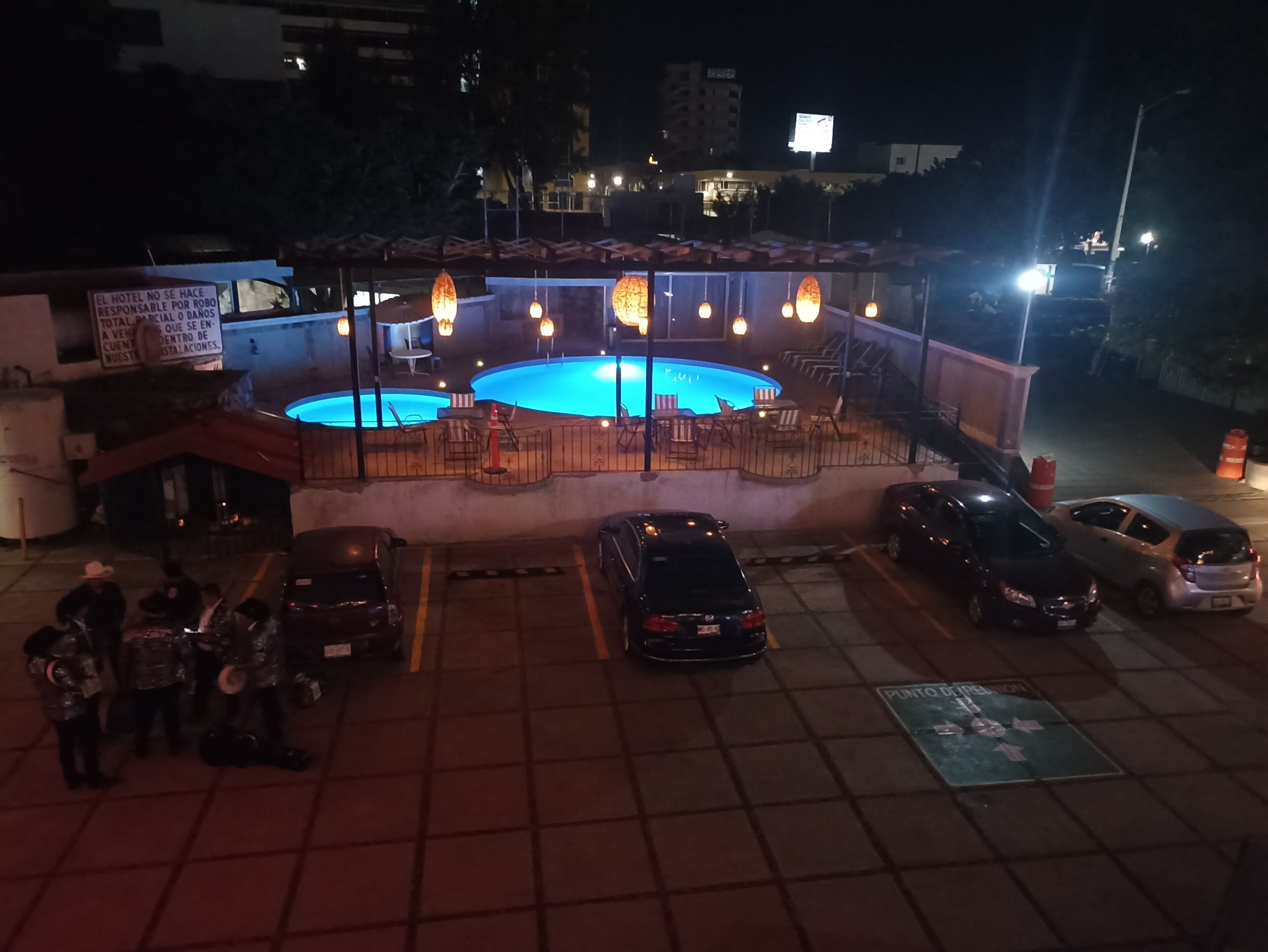 Outdoor pool, open 9:00 AM to 9:00 PM, pool loungers