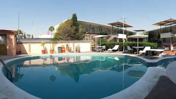 Outdoor pool, open 9:00 AM to 9:00 PM, sun loungers