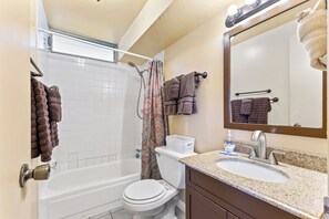 Combined shower/tub, hair dryer, towels, soap - Large Studio - 2 Decks - 2 Short Blocks From Beach - #703-A (Honolulu)
