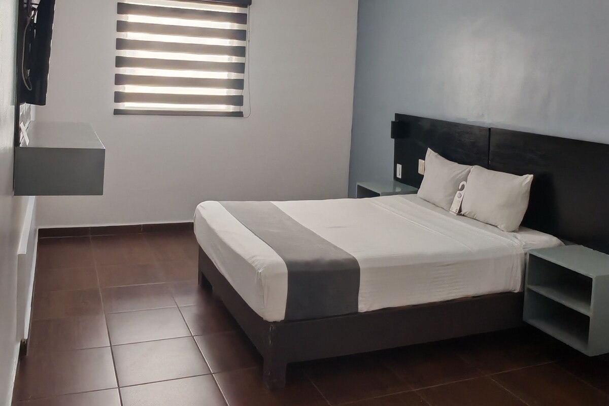 Cortinas blackout, wifi gratis y ropa de cama 