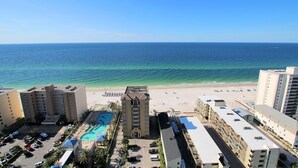 A beachfront hotel with a swimming pool, beach access, and ocean views. - Crystal Tower 609 (Gulf Shores)
