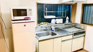 Fridge, microwave, cookware/dishes/utensils