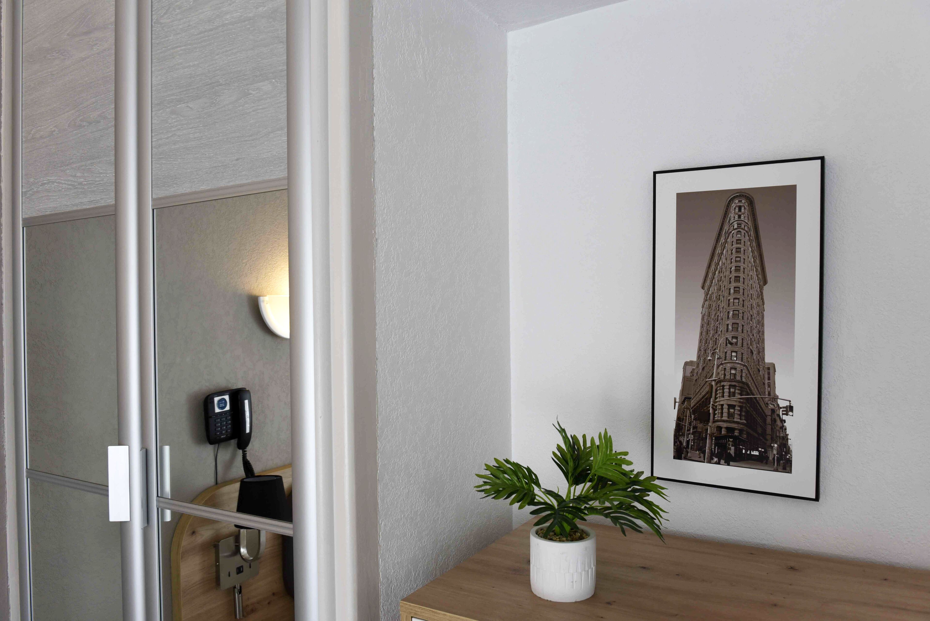 basic quadruple room, multiple beds, non smoking | 1 bedroom, minibar, in-room safe, individually decorated