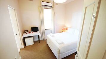 Premium bedding, down duvets, individually decorated