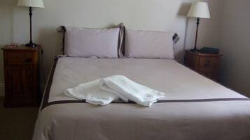 Premium bedding, down duvets, individually decorated